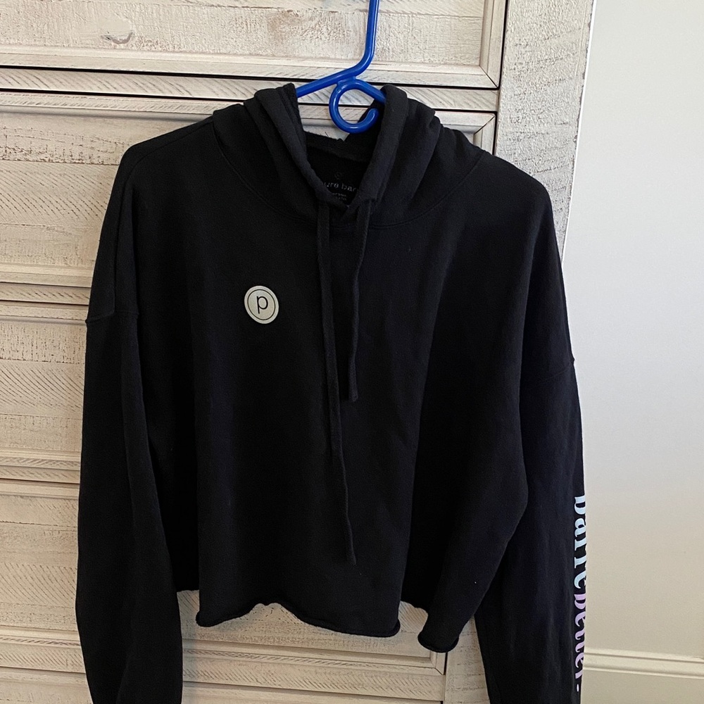 Pure Barre Black Zip-Up Hooded Sweater with Sleeve Logo.